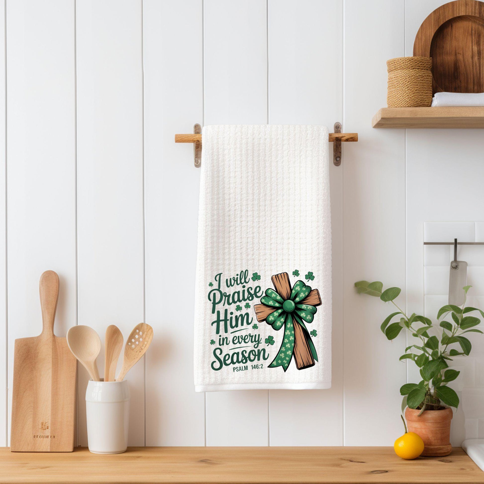 Folded green kitchen towel with Psalm 146 scripture and shamrock accents, perfect Christian St. Patrick's Day gift